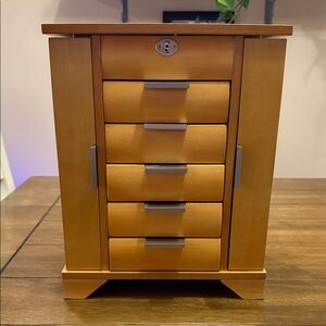 Beautiful light wood Seya jewelry box with lots of storage!